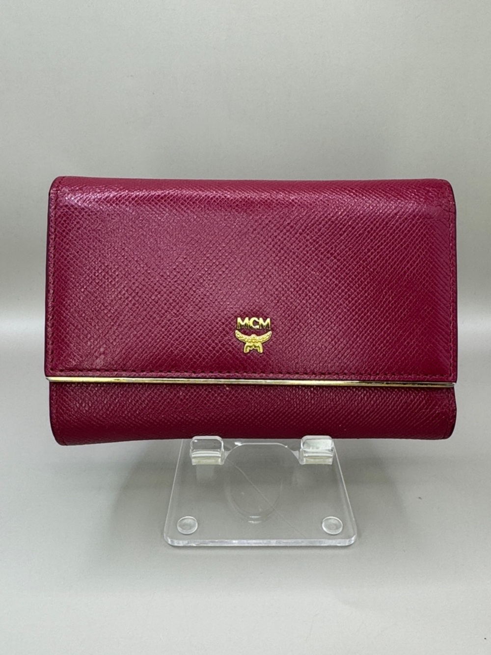 MCM burgundy leather tri-fold wallet,